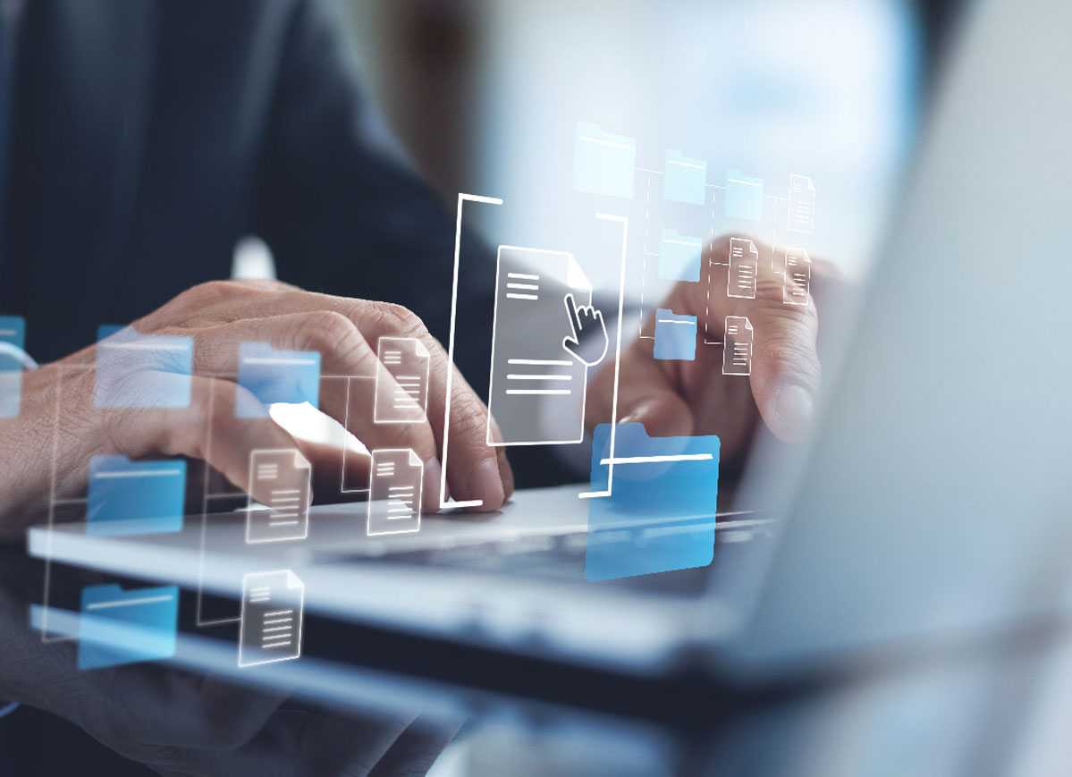 person typing with graphic icon overlayed